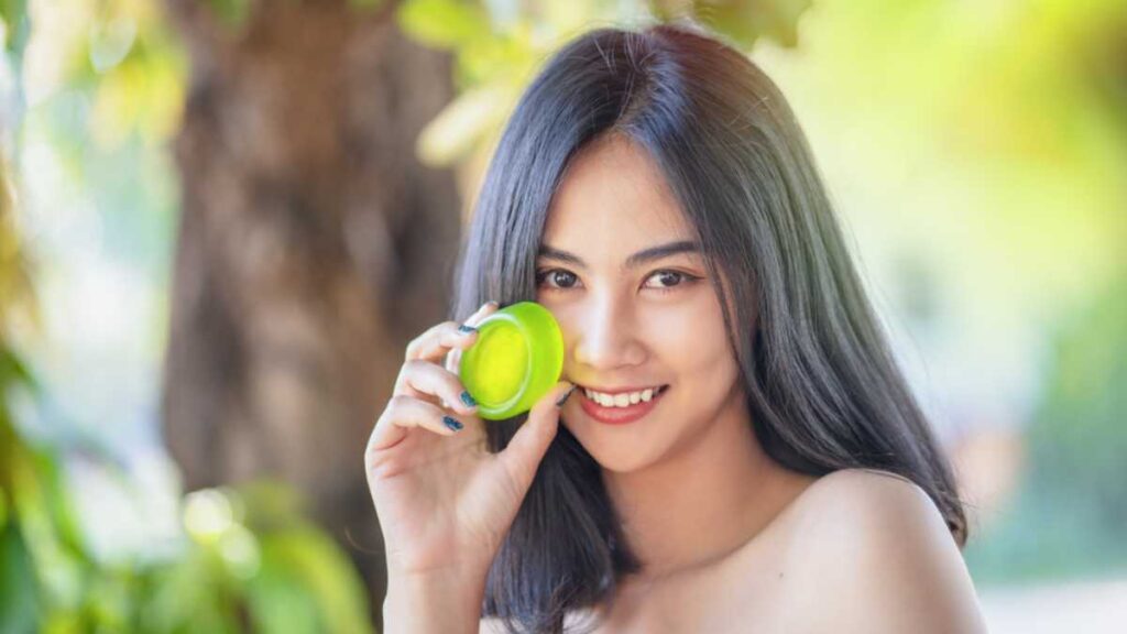 Woman holding green soap