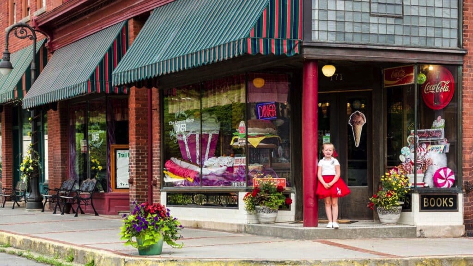 little girl outside a store in Bramwell, WV