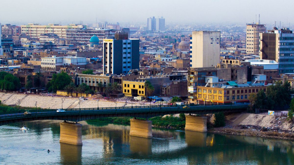 Aerial photo of the city of Baghdad, and shows where residential complexes and the Tigris River and bridge. and many of cars were passing. The city of Baghdad, capital