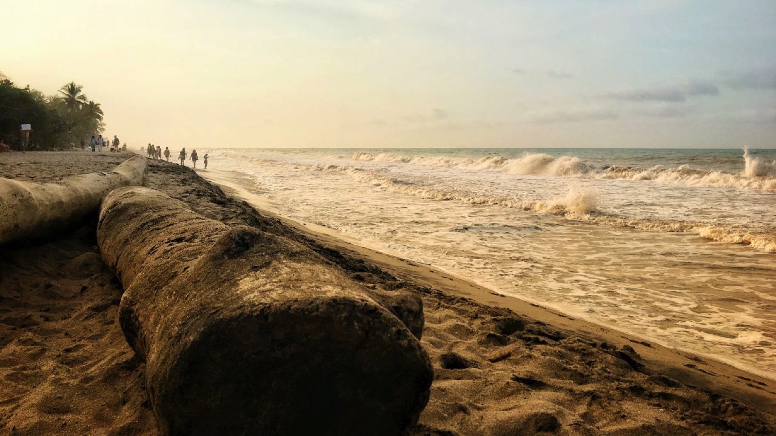 Beautiful sunset scenery at the backpacker destination Palomino beach on the Caribbean coast of Colombia