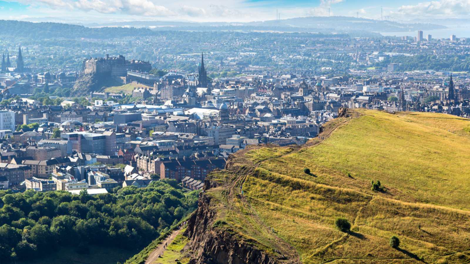 Cityscape of Edinburgh from Arthur's Seat in a beautiful summer day, Scotland, United Kingdom