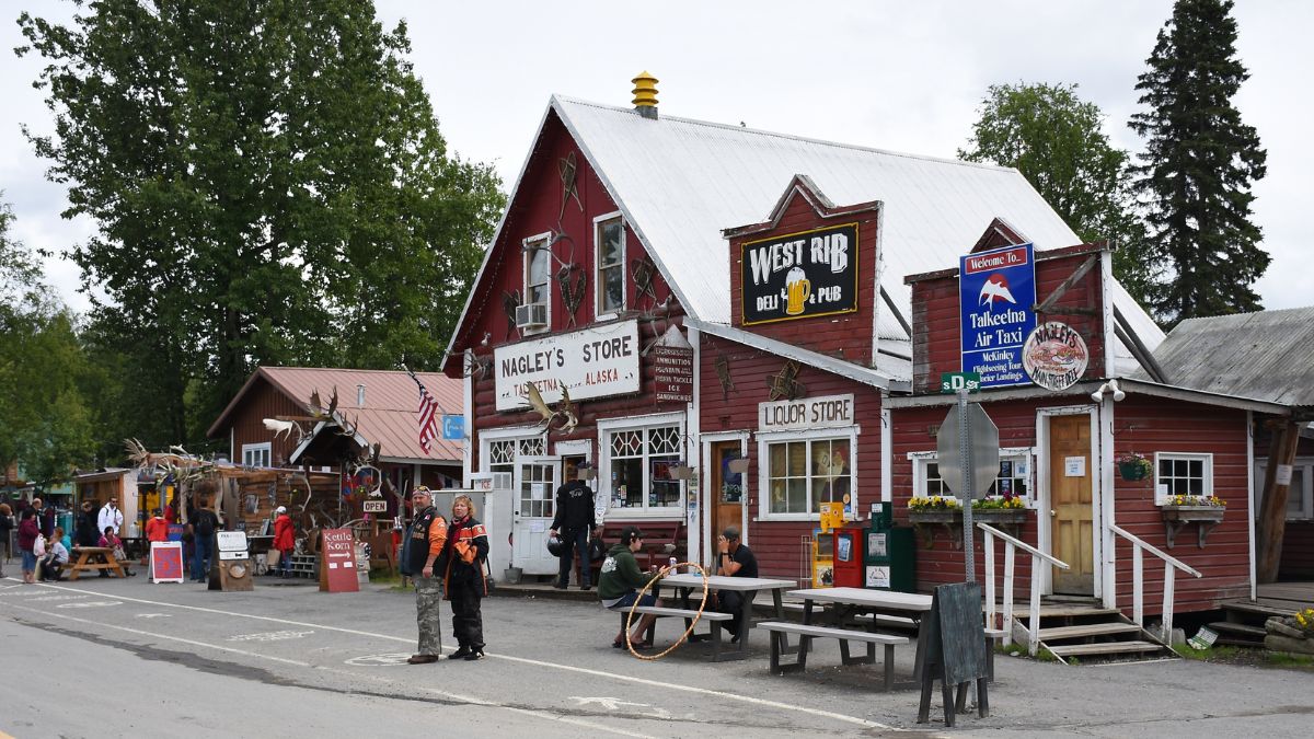 Facade of stores and pubs in the small old town of Talkeetna