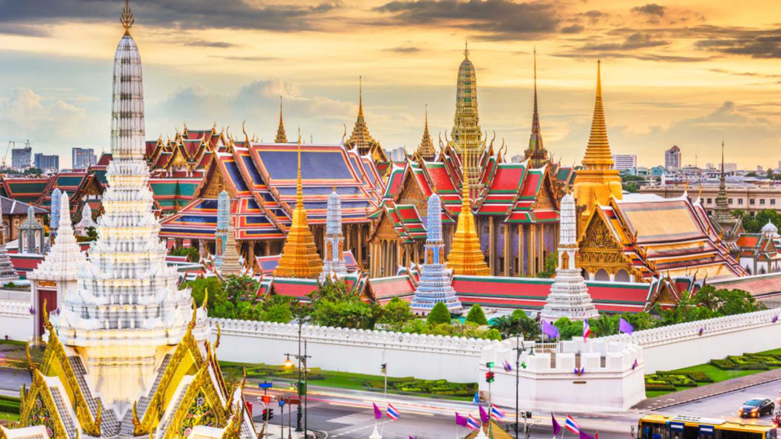 Bangkok, Thailand at the Temple of the Emerald Buddha and Grand Palace at dusk.