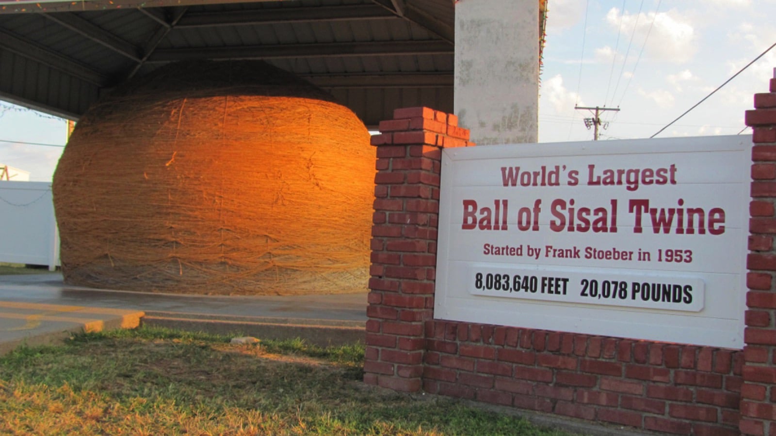 Cawker City, KS / USA - September 28, 2015: The world's largest ball of sisal twine sits proudly under a protective canopy in Cawker City, KS.