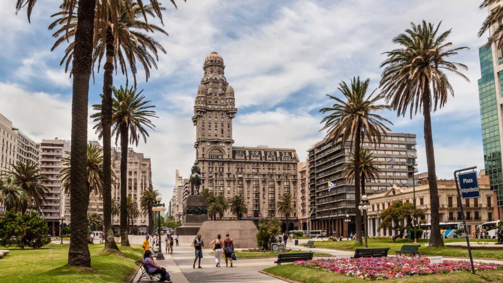 MONTEVIDEO, URUGUAY - DECEMBER 15: Plaza indepedencia with the building Palacio Salvo and the statue of Jose Artigas in Montevideo, Uruguay at December 15, 2012.