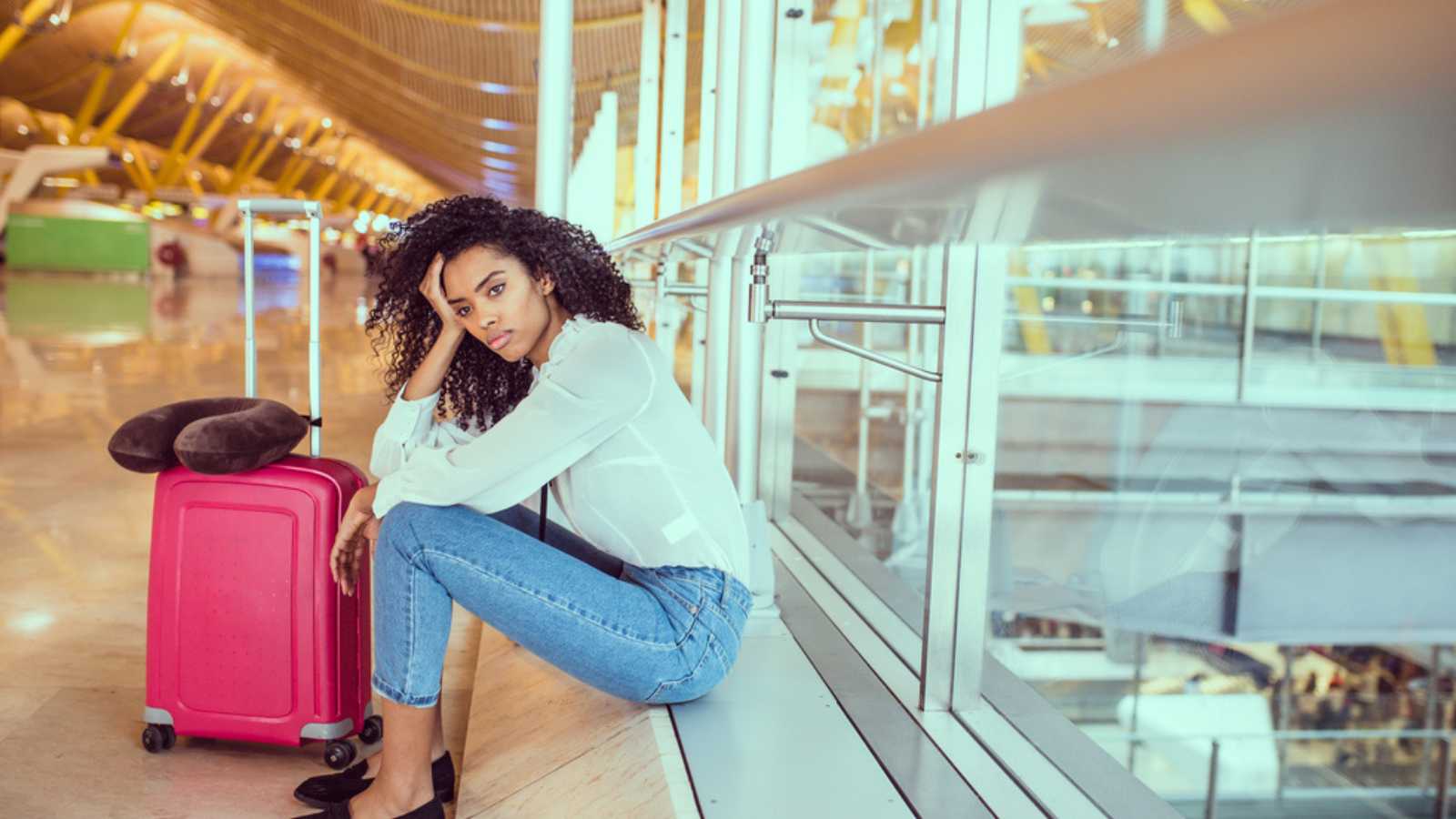 Woman disappointed in airport