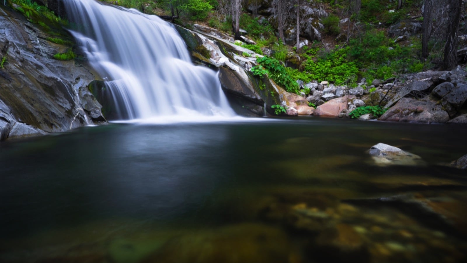 The pool at the base of Carlon Waterfall is popular for wading and swimming in the summertime.