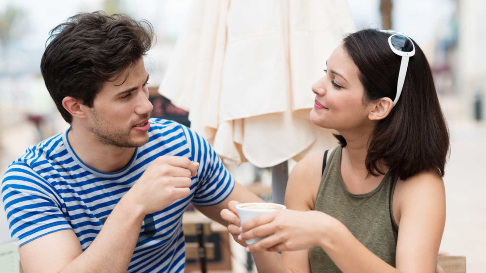 Couples talking while having coffee