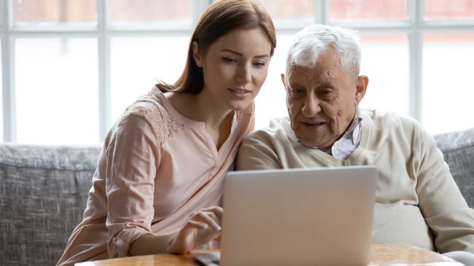 Daughter teaching computer