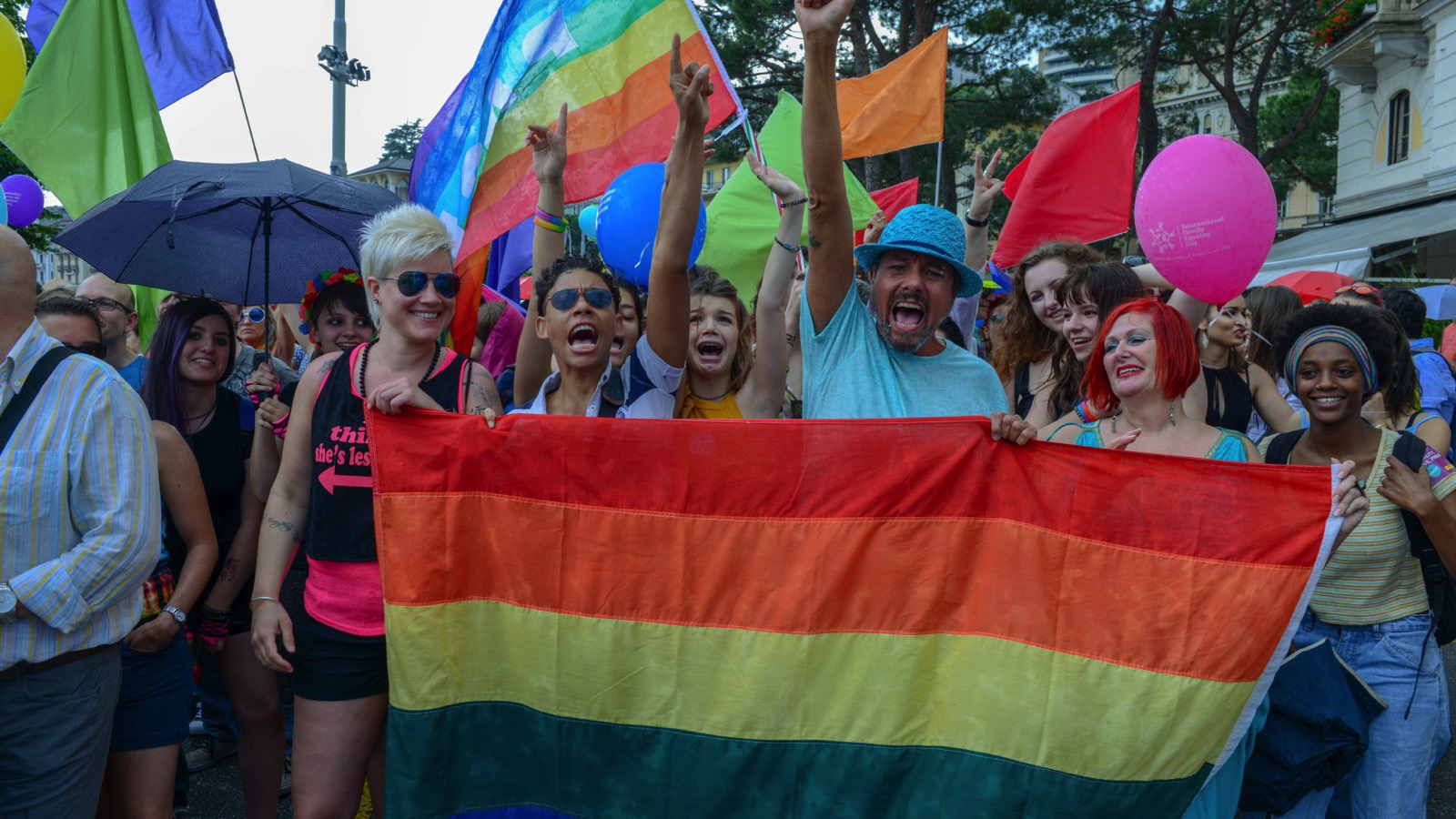 Gay and lesbian walking in parade