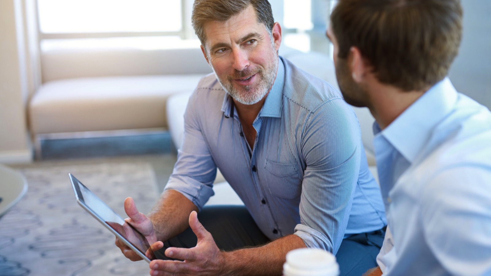 Man talking to another man