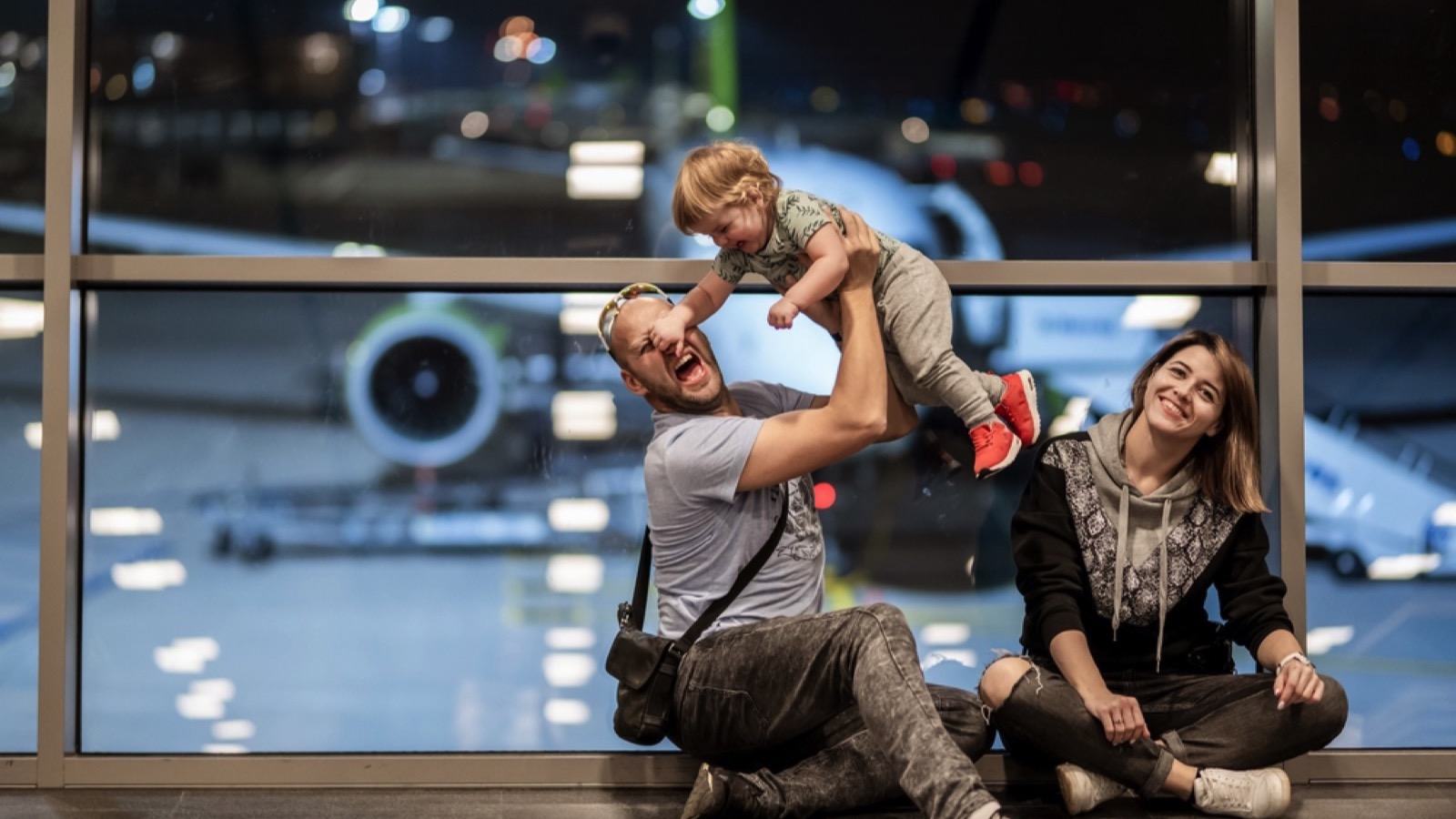 Playing with baby in airport