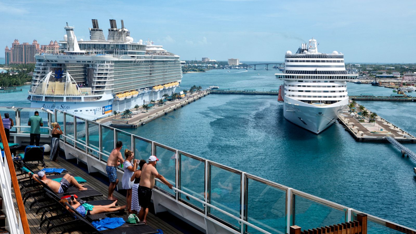 Cruise ships docked in port of Nassau, Bahamas, with view to Atlantis Paradise Island.