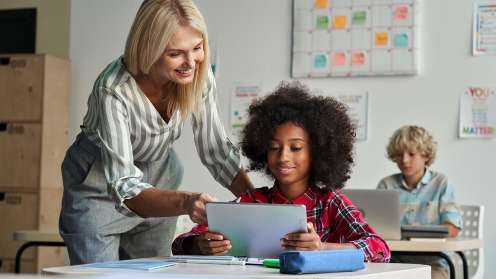 Teacher teaching student