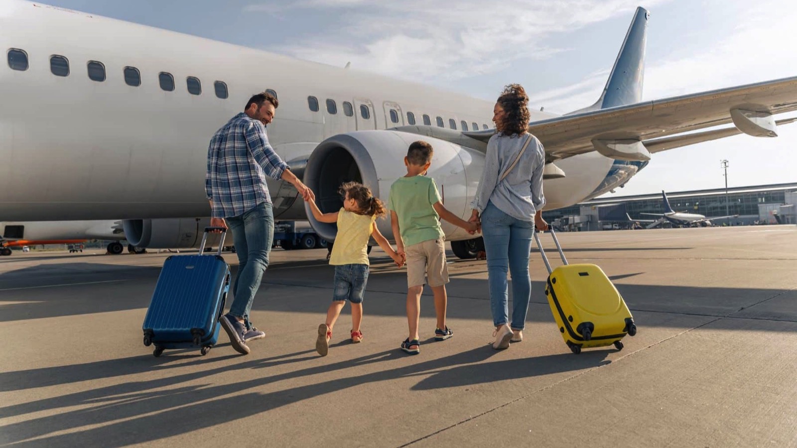 Family boarding plane