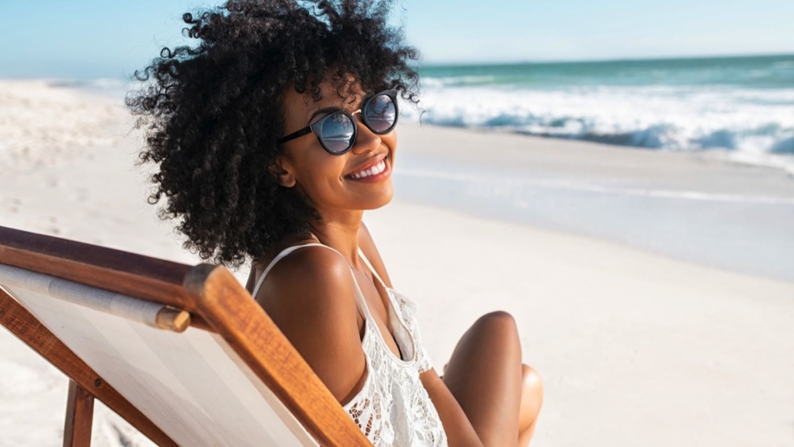 Woman-enjoying-near-beach