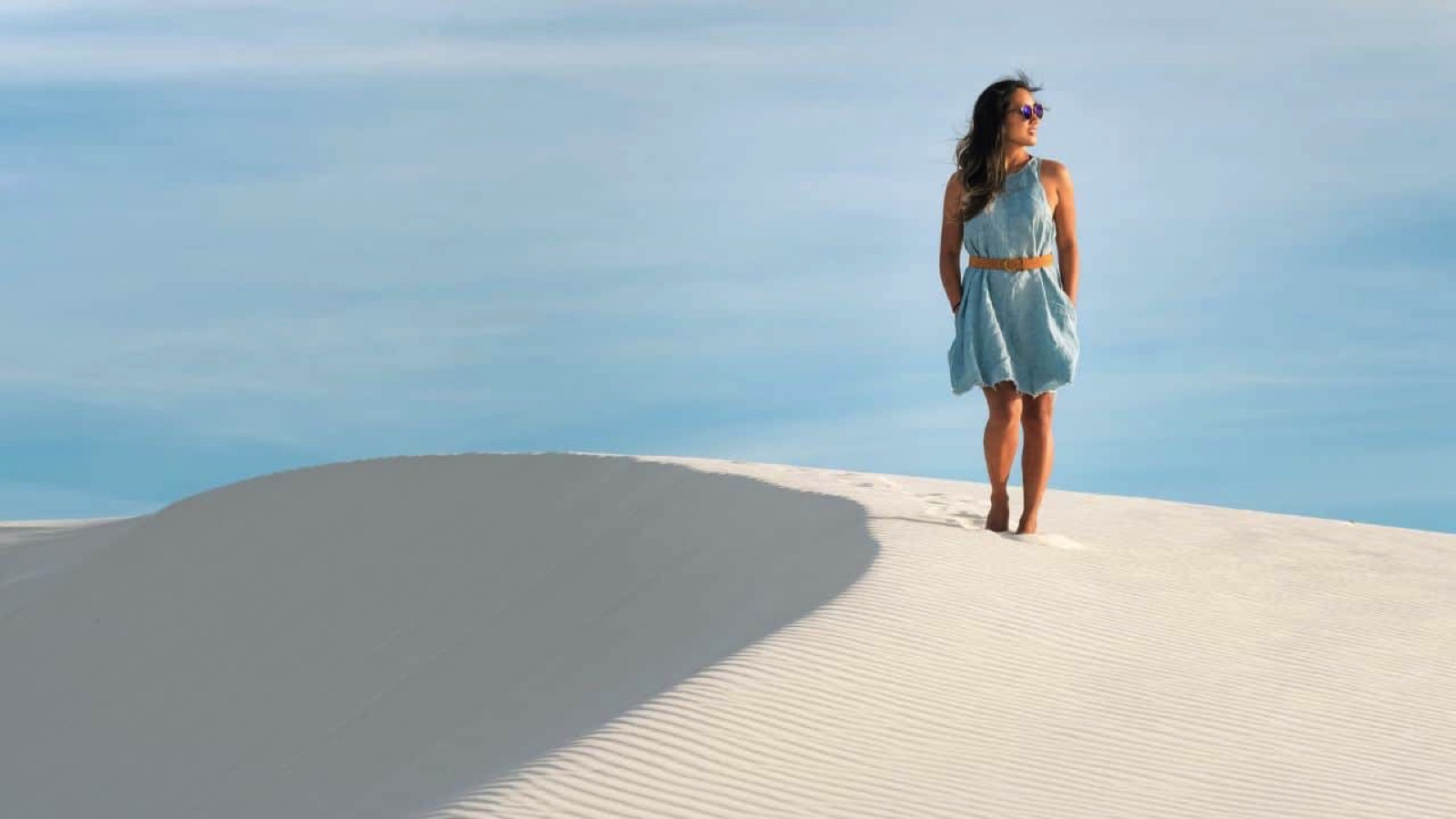 Woman exploring White Sands National Monument, New Mexico USA