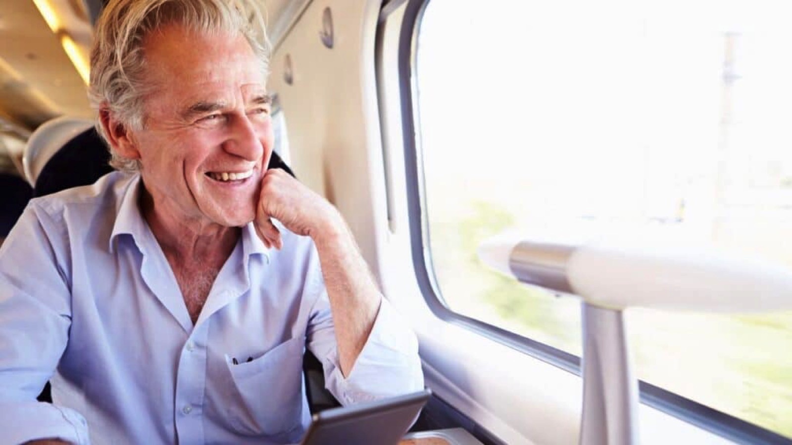 senior-man-on-train