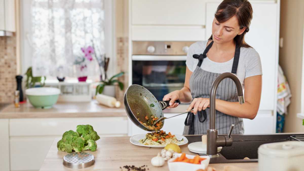 Cooking in kitchen