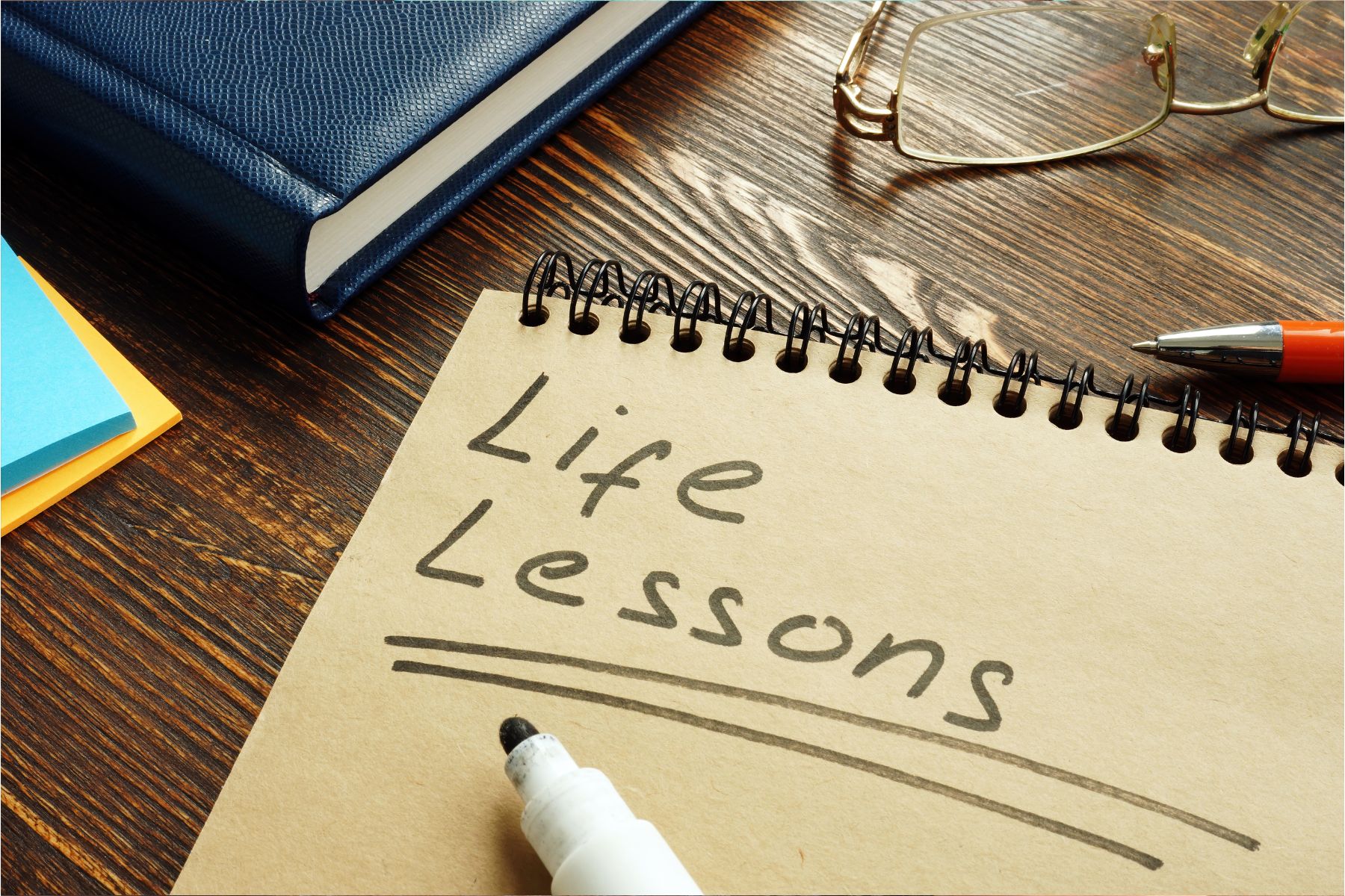 Life-lessons-handwritten-on-the-page-and-glasses