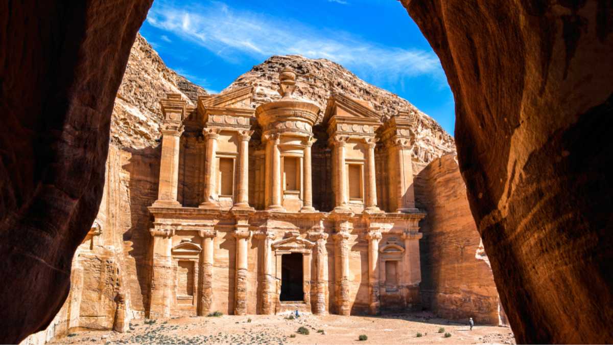 Stunning view from a cave of the Ad Deir - Monastery in the ancient city of Petra, Jordan: Incredible UNESCO World Heritage Site.