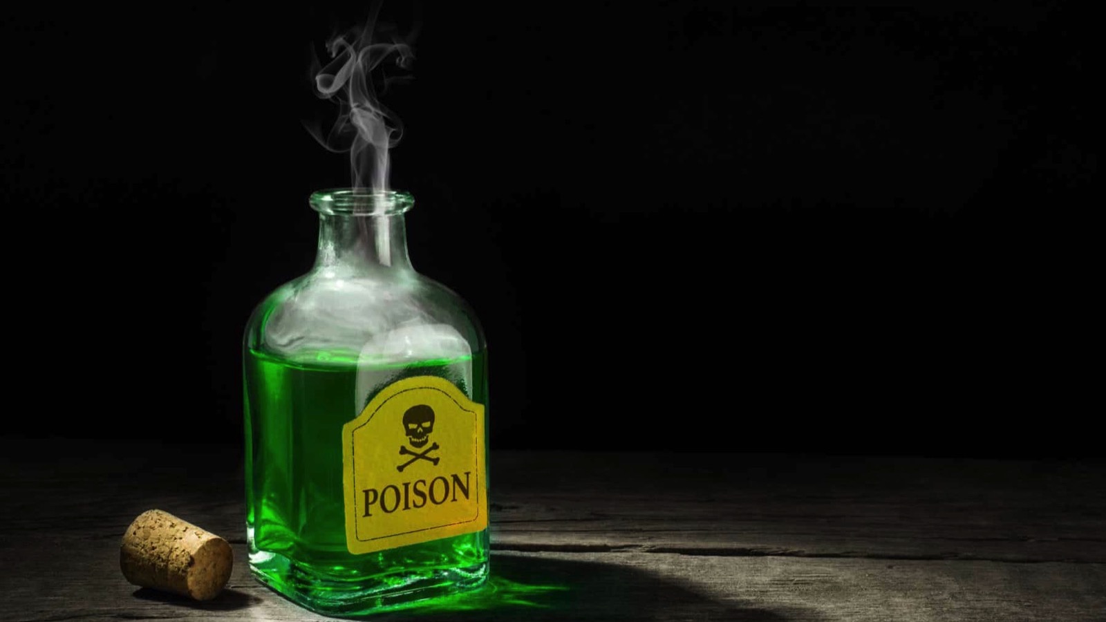 The-poison-is-a-green-liquid-in-a-glass-vial.-