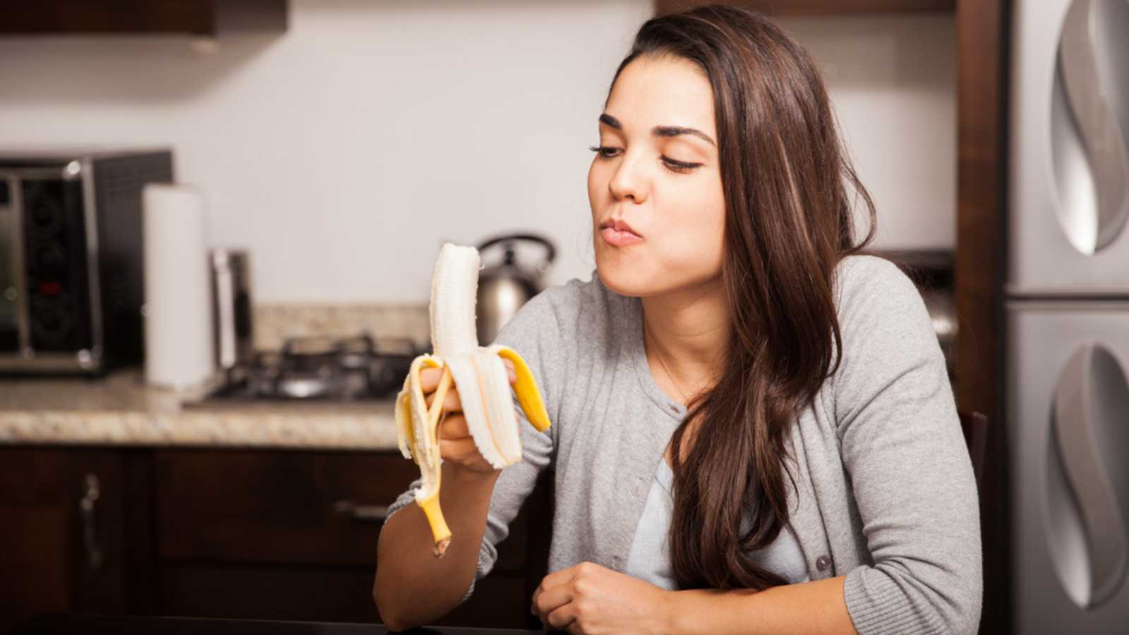 Woman-eating-banana