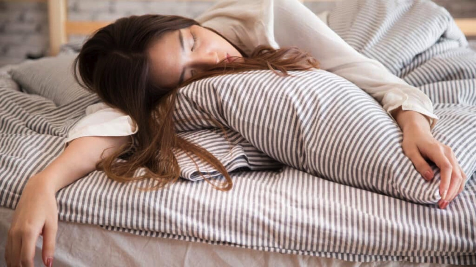 Woman sleeping in bed