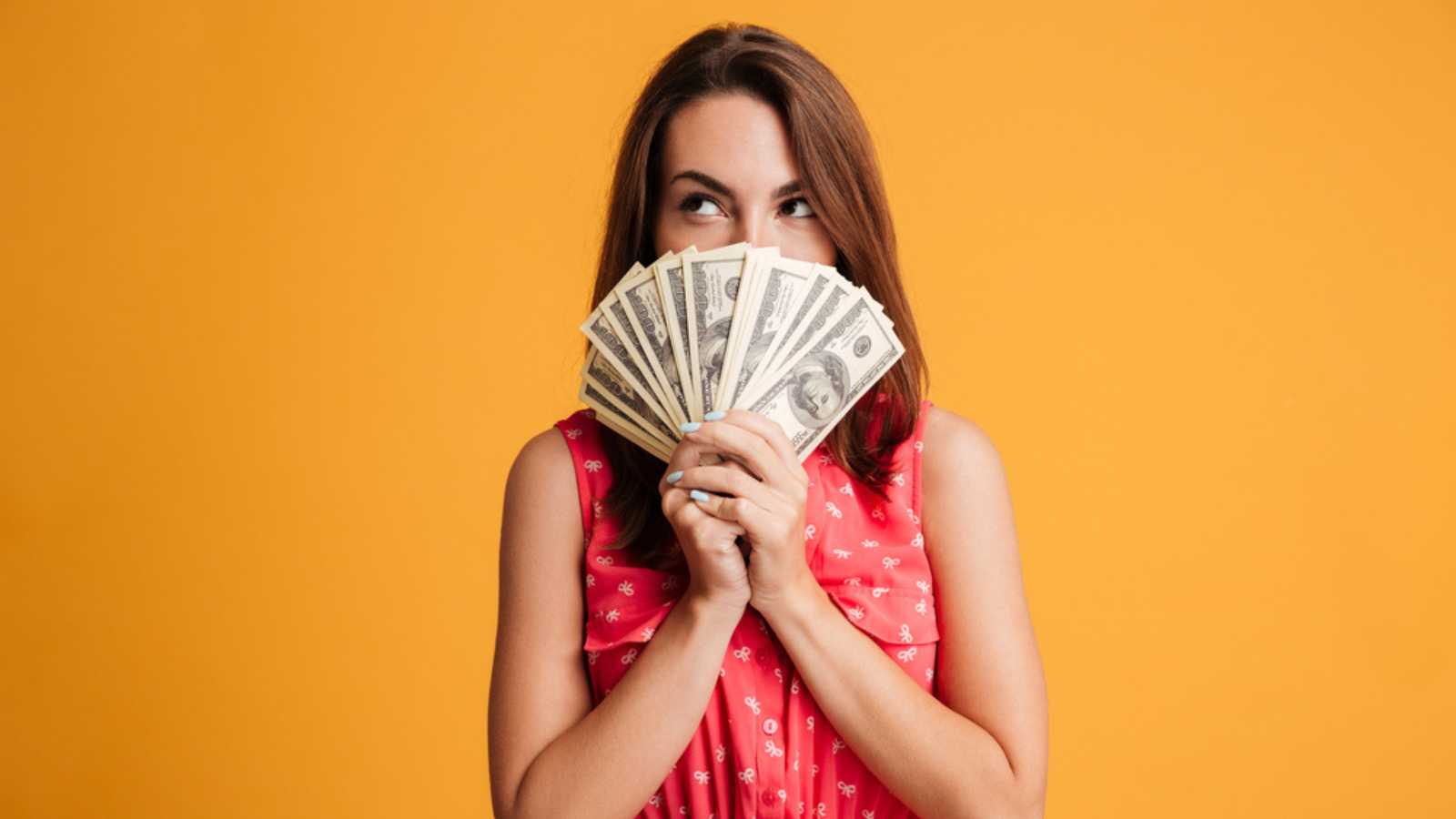 Woman-with-money-closing-face