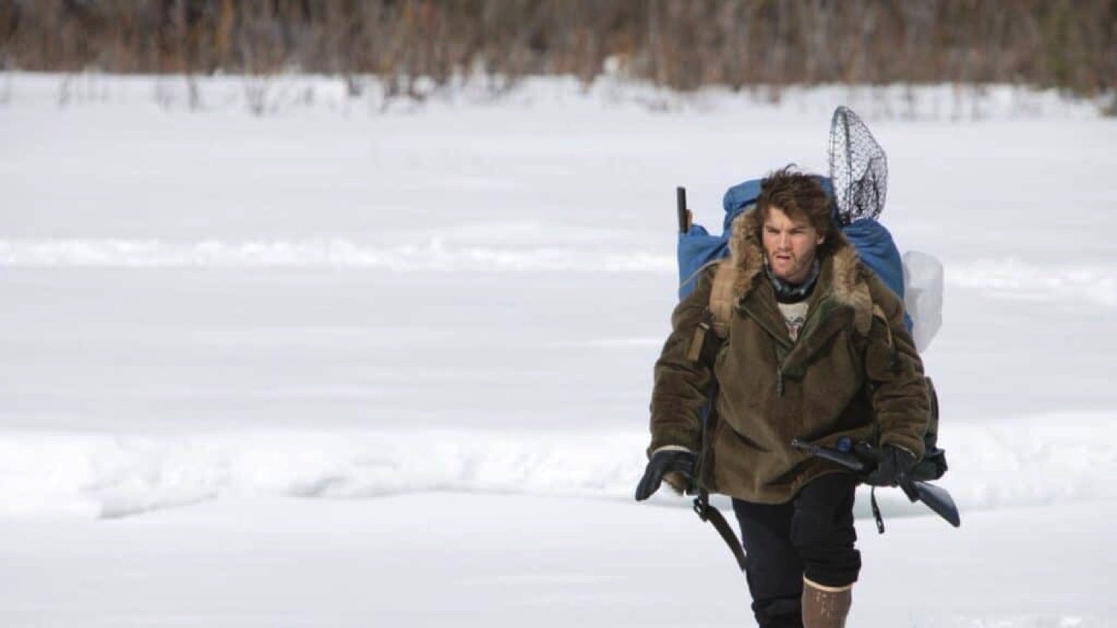 actor emile hirsch walking in the snow