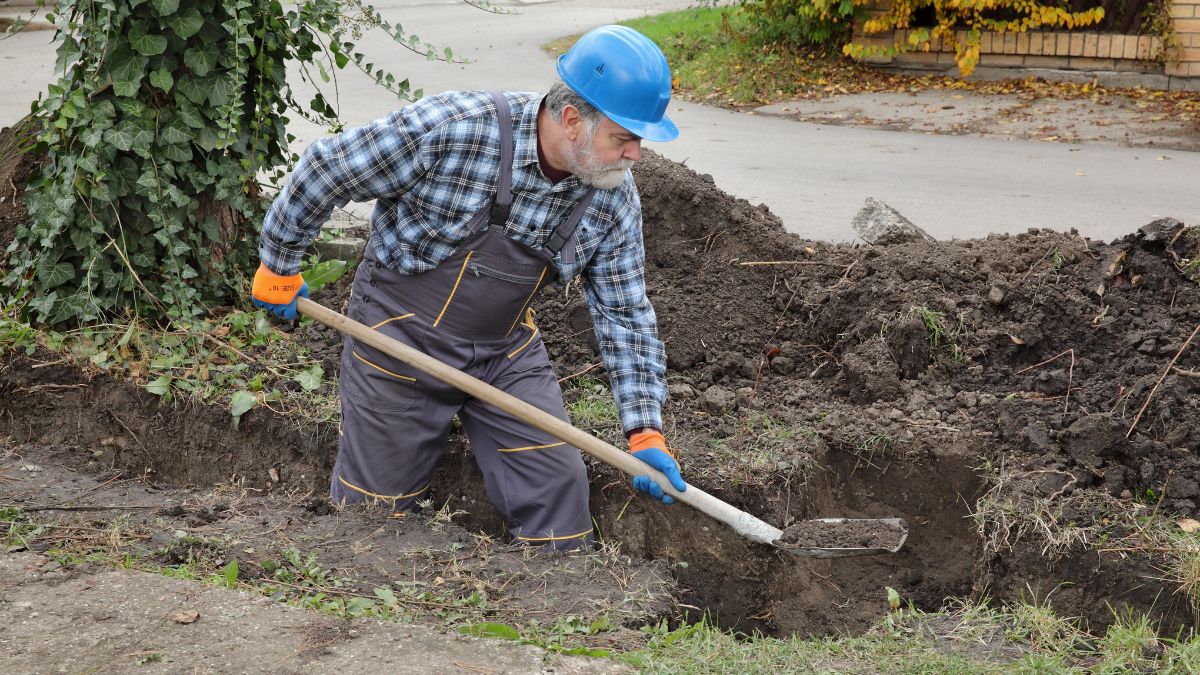 man-digging-hole