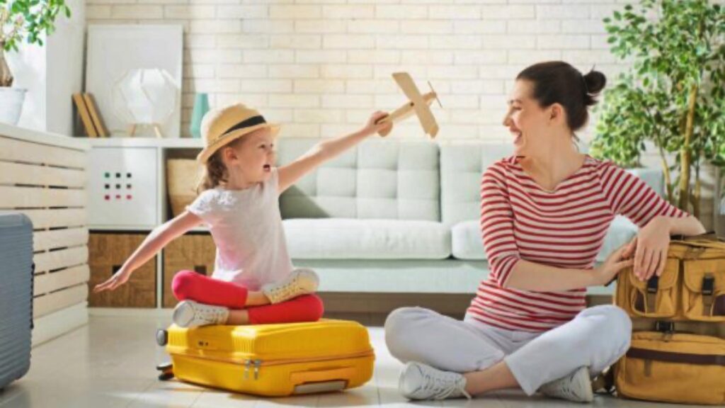 Mother and child packing for a trip