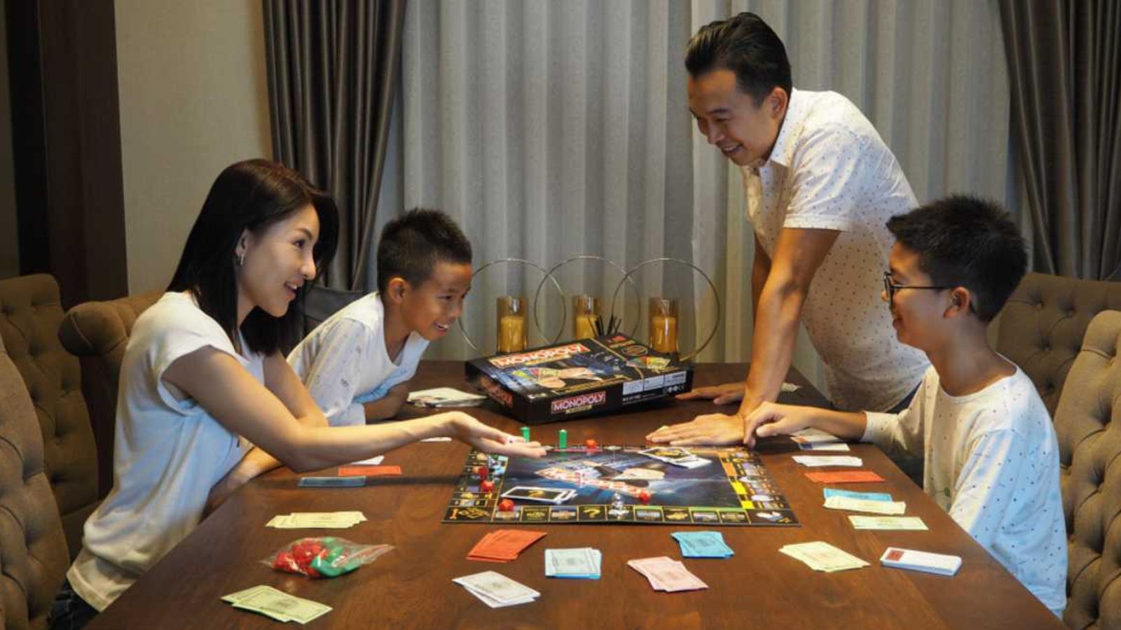 family playing board games