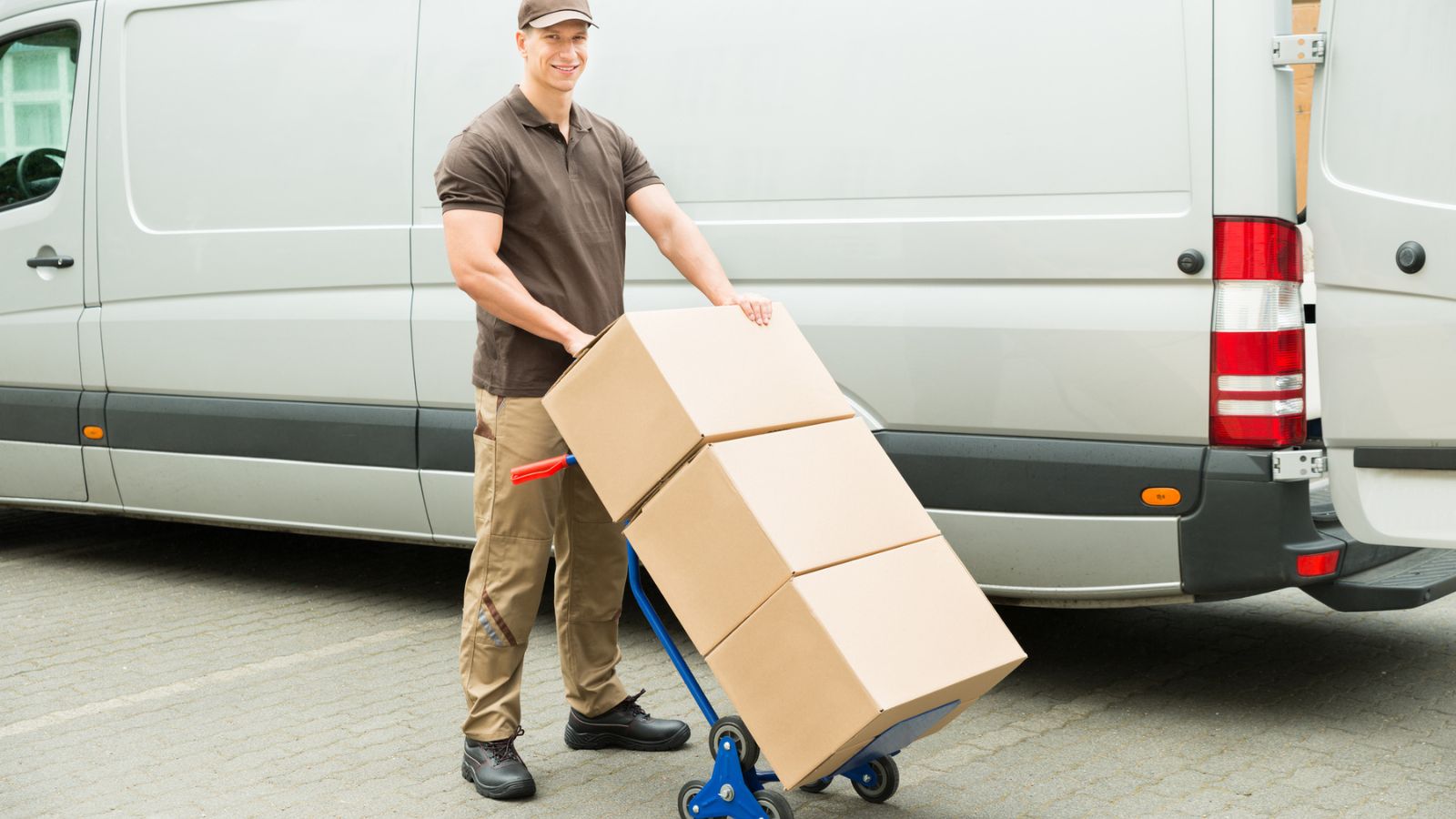 Delivery Man Holding Trolley