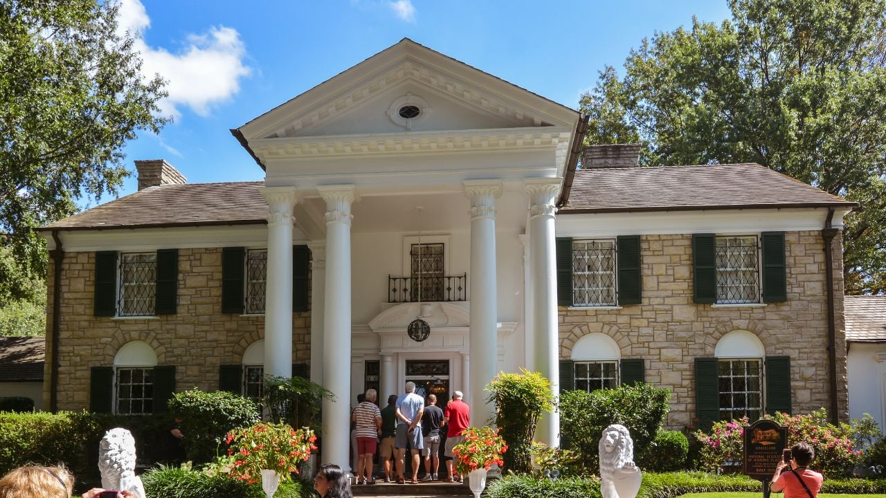 tourists visit Elvis Presley's Graceland Mansion