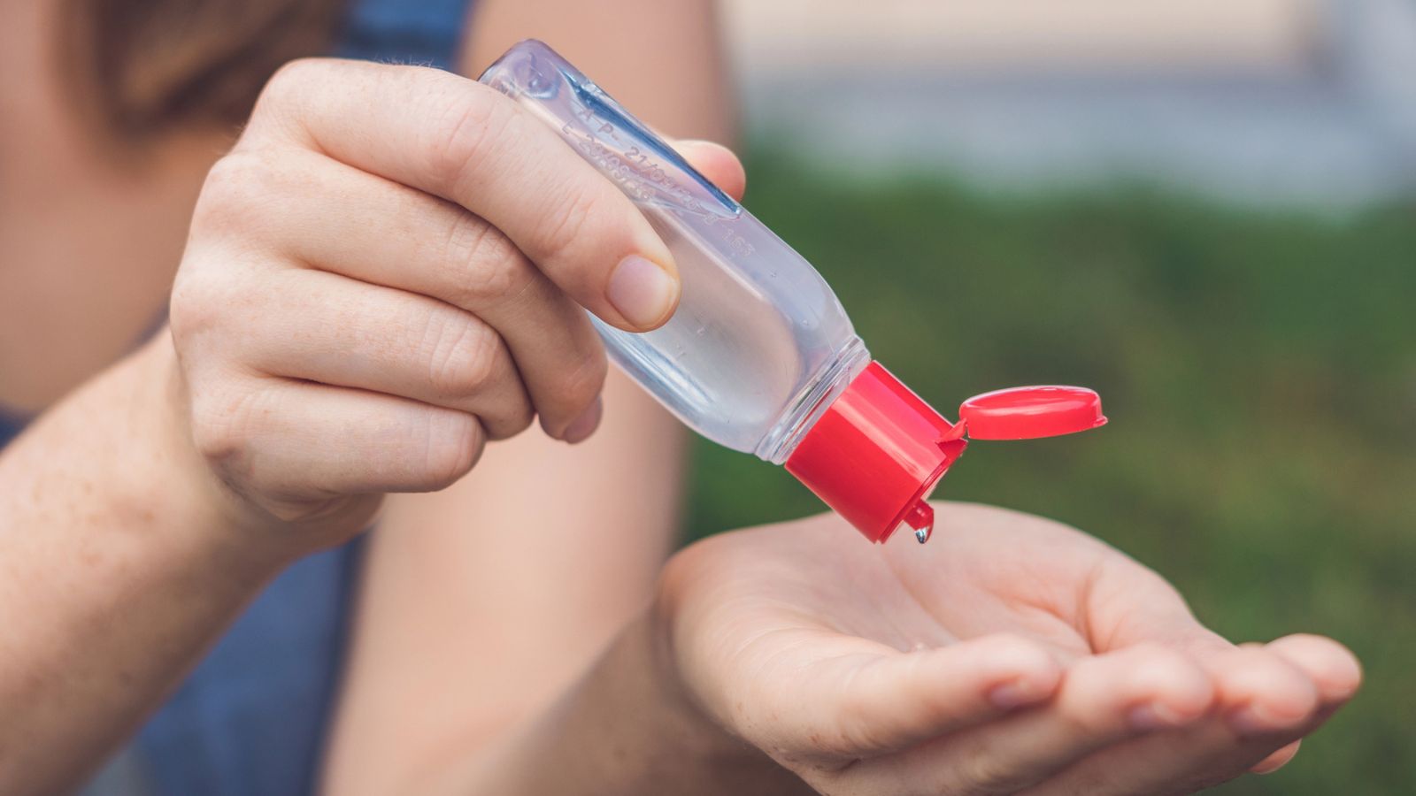 hand sanitizer with a red top