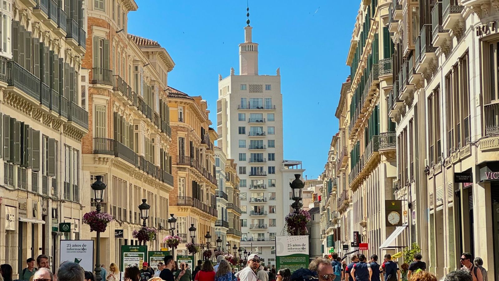 tourists walking in porthole in malaga spain