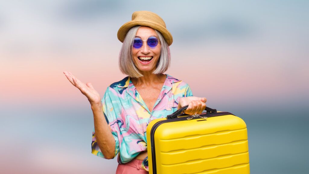 mature traveler with suitcase 60s