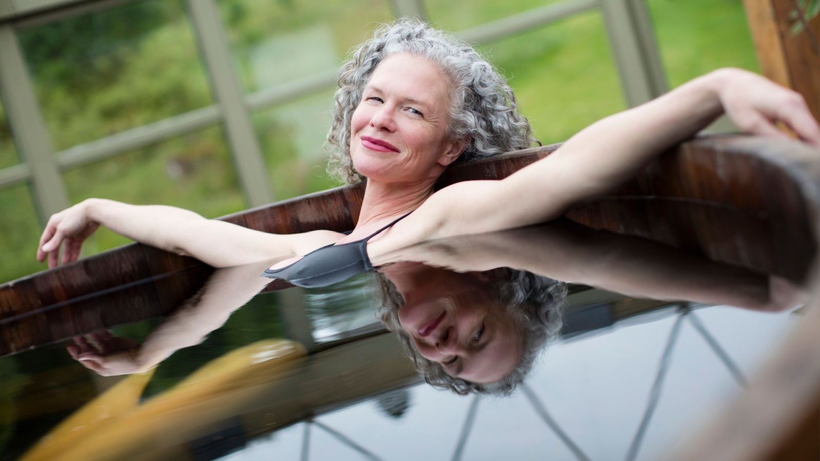 retiree mature woman in hot tub