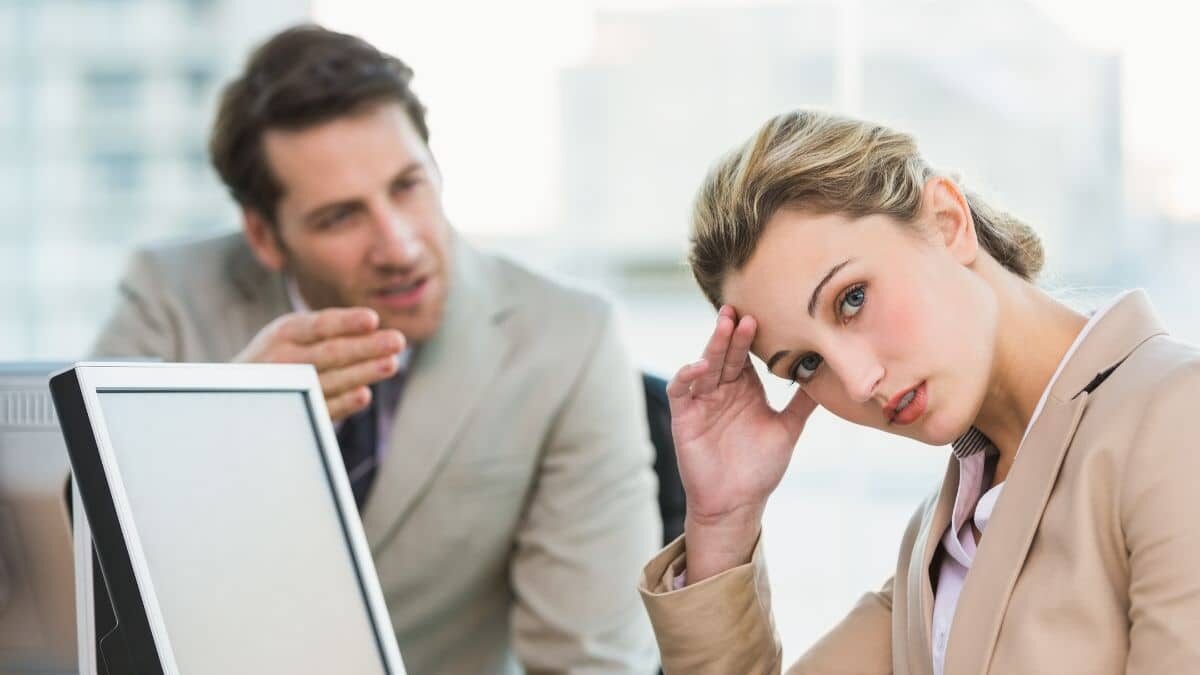 woman-unhappy-at-office-with-coworker